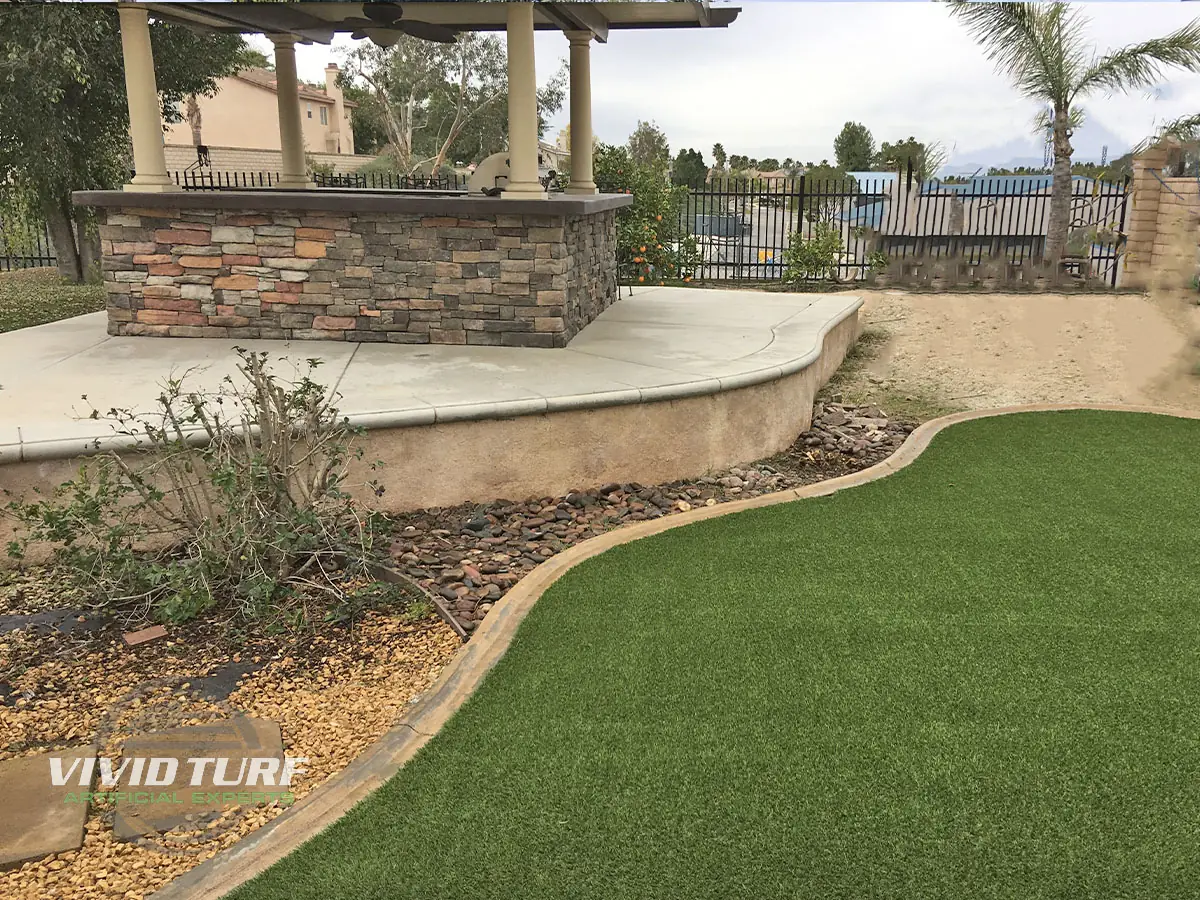 Backyard lawn with a curved border