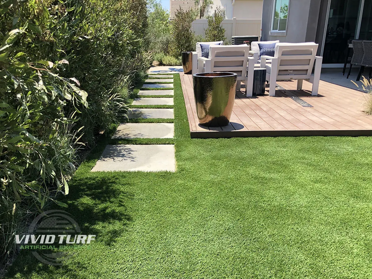 Lawn beside a wood deck