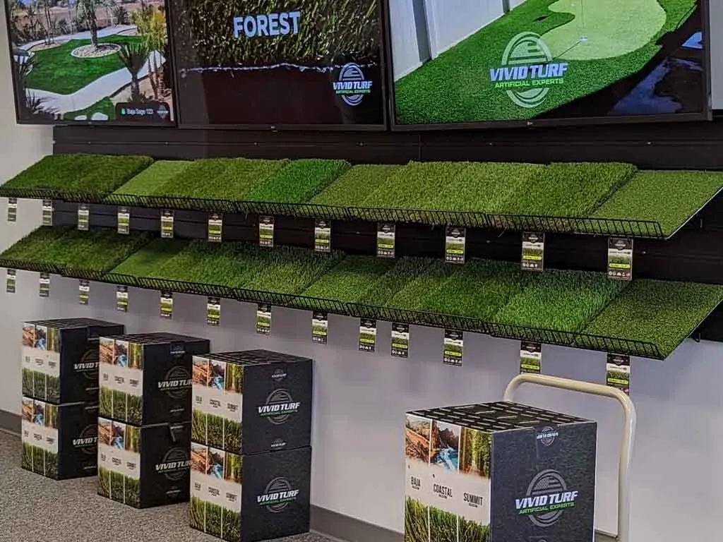 Turf samples and boxed rolls on display in the Vivid Turf Huntington Beach showroom